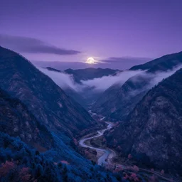 Panoramic photo where the mountains are towering over the valley below their peaks shrouded in mist. It is night and the moon is just peeking over the horizon and the purple sky is covered with stars and clouds. The river is winding its way through the valley and the trees are blue and pink