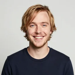 A portrait of special needs Logan Paul. Happy.
