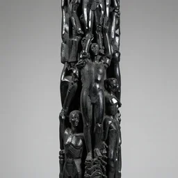 black obsidian pillar made out of human shapes and figures, limbs, parts