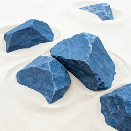 cool blue angular slate rocks in the pale sand