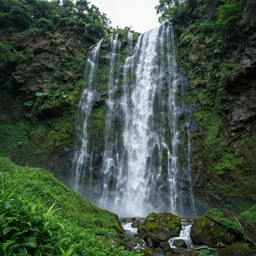 realistic photo of waterfalls flowing from lush green mountains, very sharp focus, in the style of greg rutswoski, very hyper realistic, highly detailed, fantasy art station