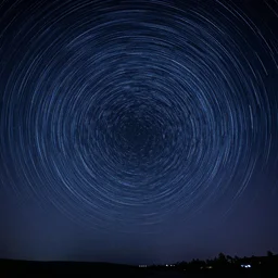long exposure shot of the night sky, vivid, circular