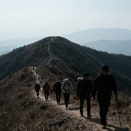 hikers going up a mountain, view from above, silhouette victor ngai
