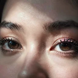 close up of eyes with sprinkles mascara