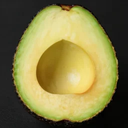 a cinematic painting of a perfect avocado half with only a tiny center piece and lots of flesh, by leonardo da vinci