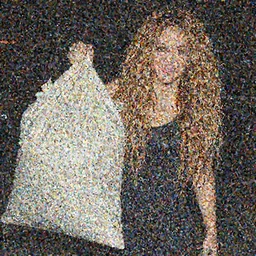 Shakira with a big bag full of cash