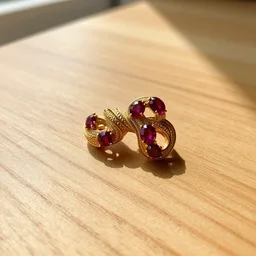 ornate gold ouroboros ruby!!! jewelry macro product photo, lying on a oak table indoors, sunlit day, f 1. 4