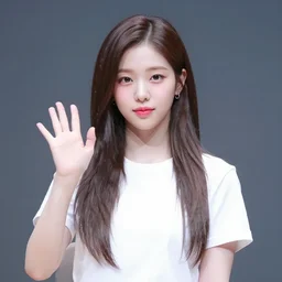 jinsoul from LOONA waving at the camera