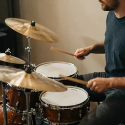 a worm playing drums