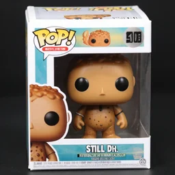 product still of a turd funko pop with box, 85mm f1.8