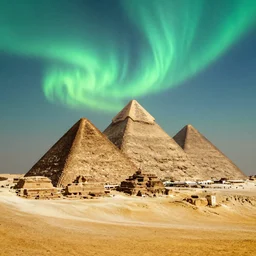 Egyptian pyramids with aurora borealis in the sky