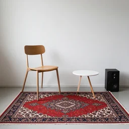 a room with a chair, a table, a speaker and a persian carpet on the floor, unsplash, postminimalism, aesthetic