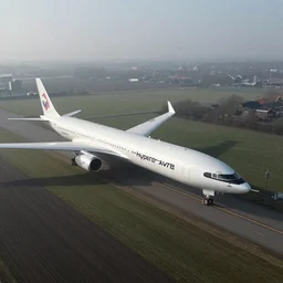 Aerial photography depicting Hyperloop in the Netherlands. Far view, humidity haze. VX video camera still