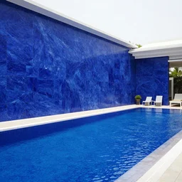 photo of a luxury swimming pool with lapis lazuli walls
