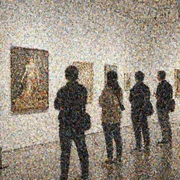 a group of people attacking an art gallery show