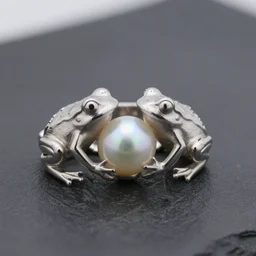 “silver frog ring, two frogs holding a pearl in the middle, high quality product image”