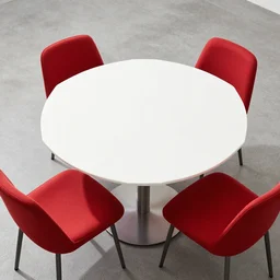 white hexagon shaped table with red chairs