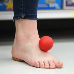 jane lynch stubs her toe on a red clown nose, at walmart