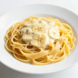 a fettuccine pasta with banana sauce, food photography
