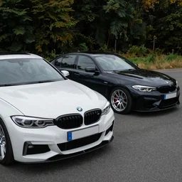 photo of a bmw 3 series next to an m 3 sedan