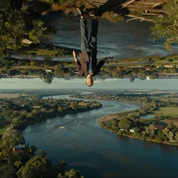 a very high resolution image from a new movie, upside - down and criss - cross river, beautiful scenery, photorealistic, photography, directed by wes anderson