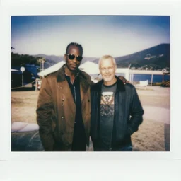 polaroid of Homelander and Billy Butcher on holiday having a great time together