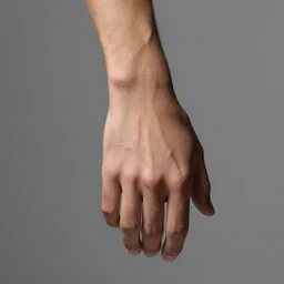 studio photograph of a male human hand with a chiseled jawline