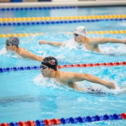 college male athletes at swim meet