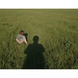 The boy, His shadow, and their loneliness, convalesce in a field over their shared heartbreak, Scott Listfield