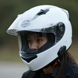 person wearing motorcycle helmet