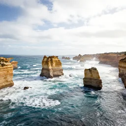 a beautiful artwork illustration, twelve apostles Australia, drone shot, breathtaking clouds, high contrast, high contrast, high contrast, vibrant colors, vivid colors, high saturation, by Greg Rutkowski and Jesper Ejsing and Raymond Swanland, featured on artstation, wide angle, vertical orientation