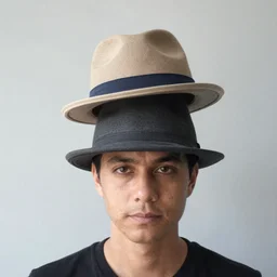 a man wearing two hats at the same time