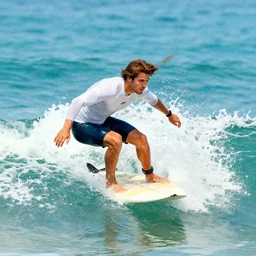 art by chris burkard showing surfer on a surfboard