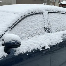 a car covered in snow, 4k