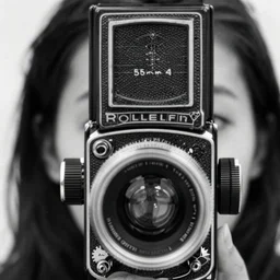 photo of Leslie by Diane Arbus, extreme closeup, black and white, high contrast, Rolleiflex, 55mm f/4 lens
