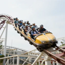 a giraffe on a roller coaster with motion - blur, going fast, 3. 5 mm photography