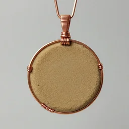 a beautiful circular pendant made of sand and dirt, tied together by copper wire