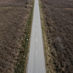 drone fottage of an old abandoned road