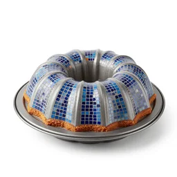 mosaic bundt cake pan, 8k product photo, isolated on a pure white background, centered, entire object in frame, sharp focus, soft studio lighting