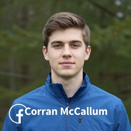 Corran McCallum [[Corran McCallum]] facebook profile image of Corran McCallum, brown hair, blue jacket infront of trees. Young brown haired man with facial hair, photo of Corran McCallum.