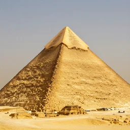 a detailed photo of a golden pyramid, shiny gold, pyramid egypt. desert amazing photo