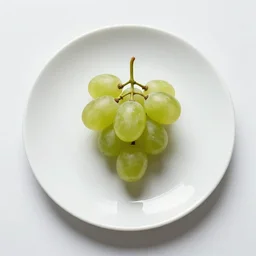 the loneliest grape on a plate realistic photograph