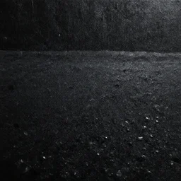 close - up of pitch vantablack oil paint covering ground at night