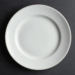 a nice big plate that is almost empty, culinary art photography