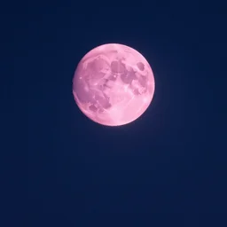a starry night with a pink moon