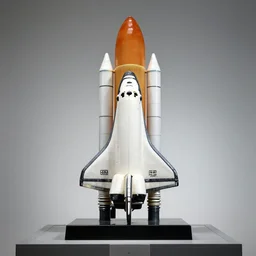 glass sculpture of space shuttle