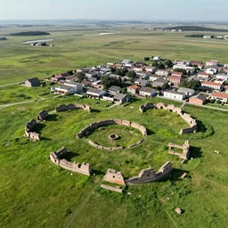 grasslands, ruins!!!! ( ( ( ( ( ( ( ( ( ( small town ) ) ) ) ) ) ) ) ) ), [ 4 k photorealism ]!!!, trending on unsplash, intricate, zoomed out photography