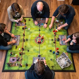 untidy flat of game designer who plays blood bowl