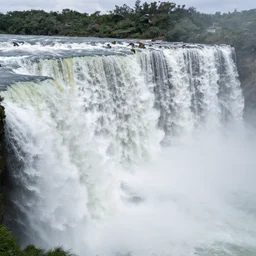 very wide waterfall ranging all left to right of the screen