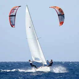 sailboat with tom cruise head as kite